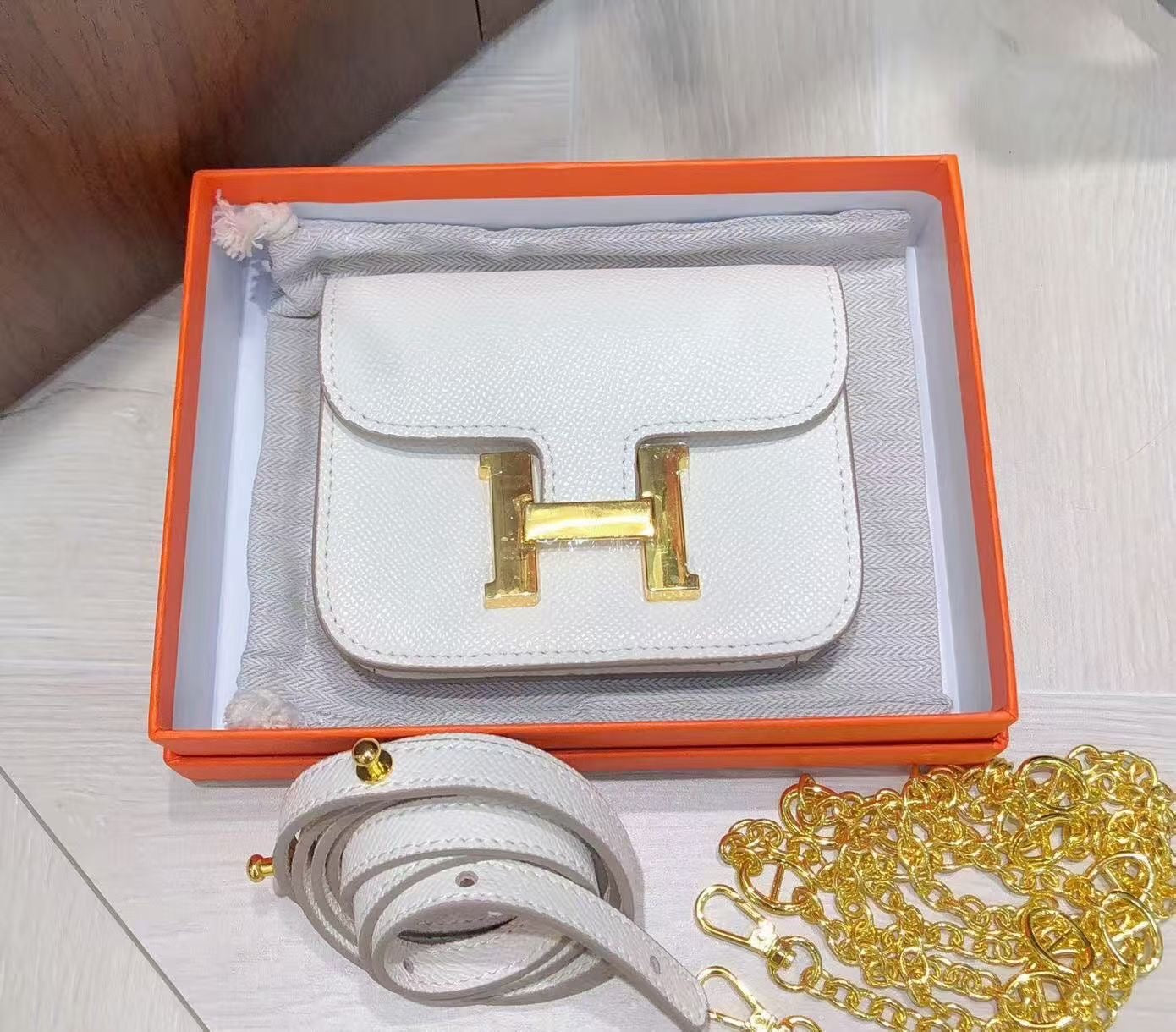 H collection - Mini H lock WOC, leather