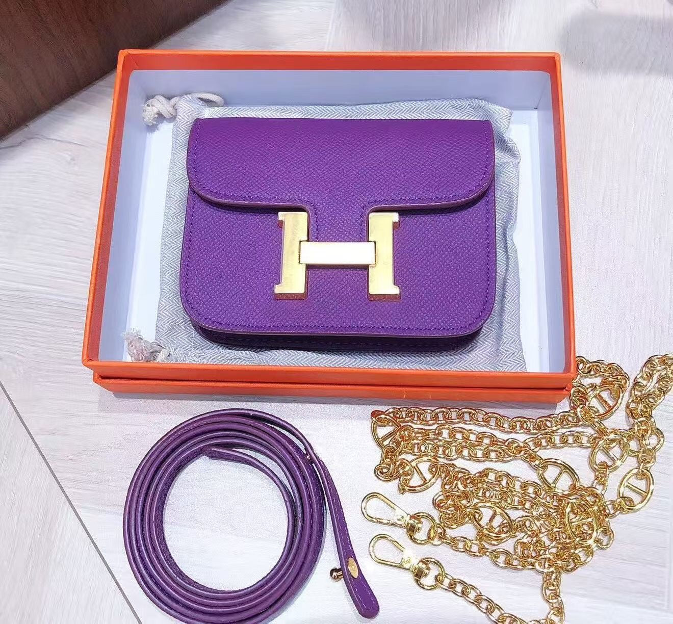 H collection - Mini H lock WOC, leather