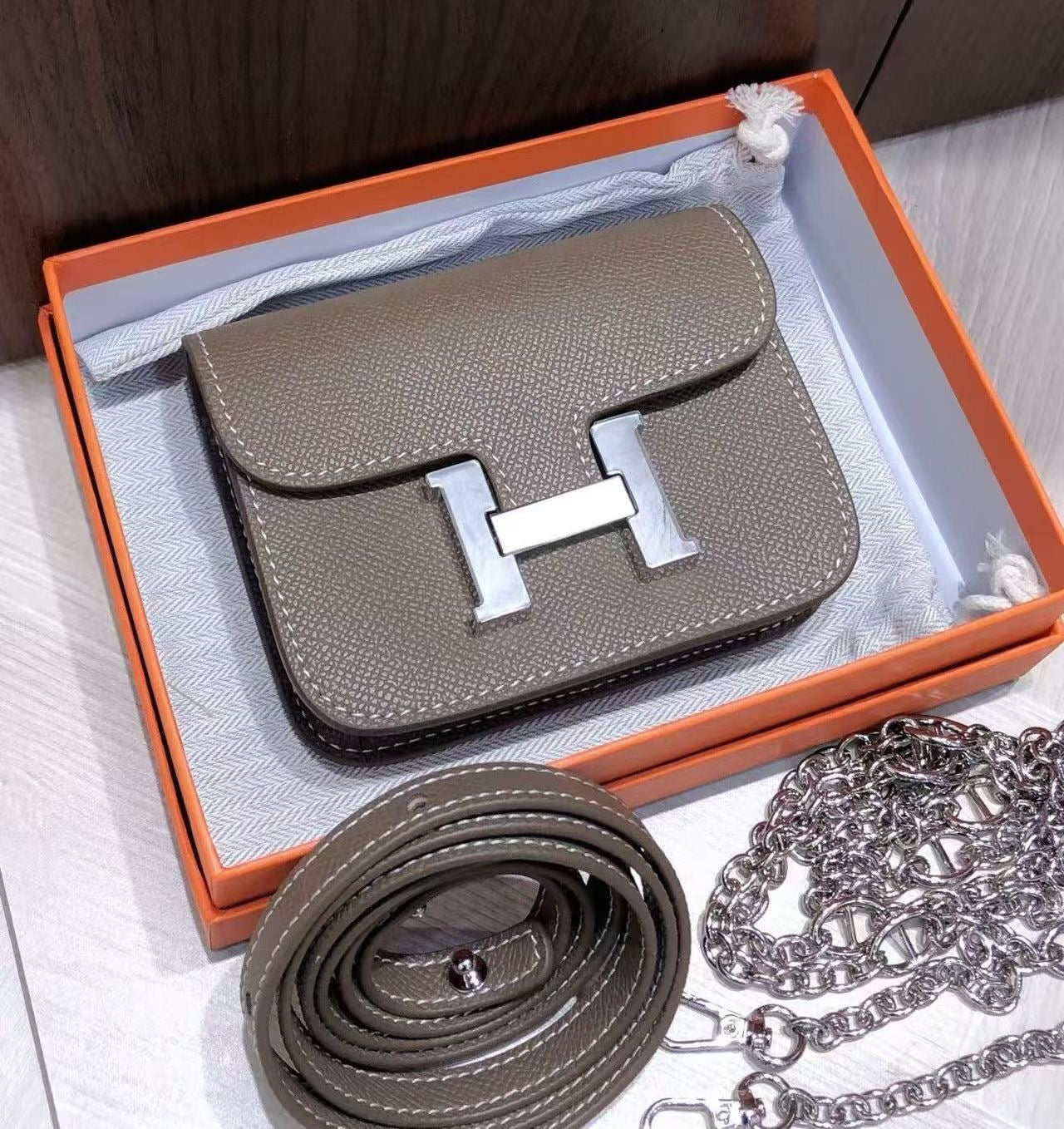 H collection - Mini H lock WOC, leather