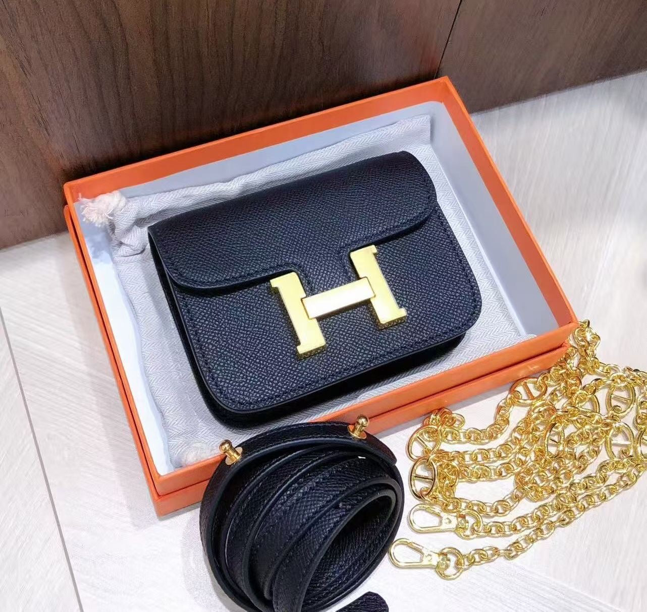 H collection - Mini H lock WOC, leather