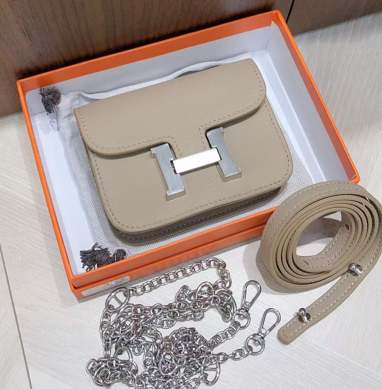 H collection - Mini H lock WOC, leather